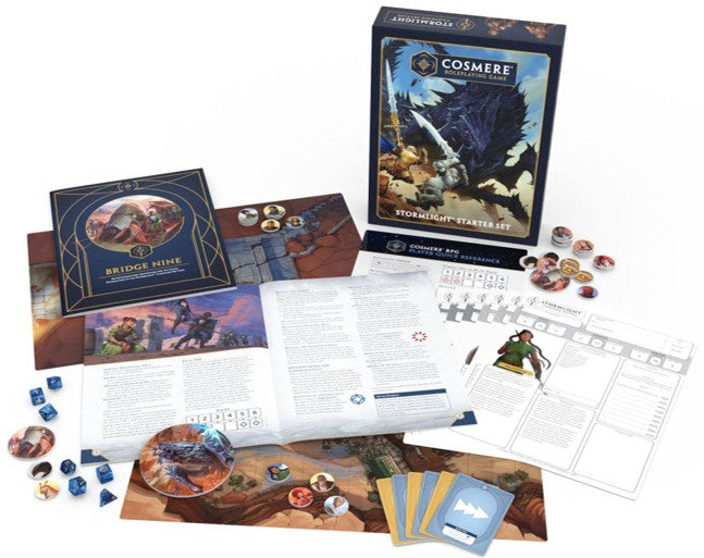Cosmere tabletop game components including cards, dice, and rulebook 